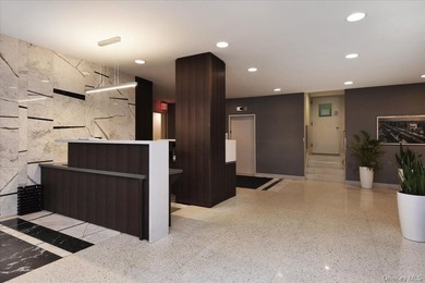 Welcome to Lane Towers, a luxury high-rise co-op with a 24-hour - photo 3