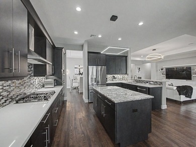 Experience elevated lakefront living in this exquisitely - photo 13
