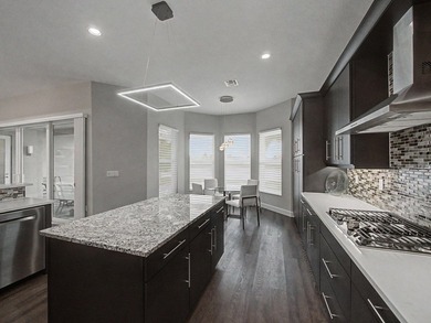 Experience elevated lakefront living in this exquisitely - photo 14
