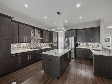 Experience elevated lakefront living in this exquisitely - photo 15