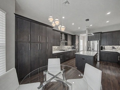 Experience elevated lakefront living in this exquisitely - photo 16