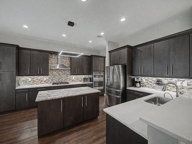 Experience elevated lakefront living in this exquisitely - photo 18