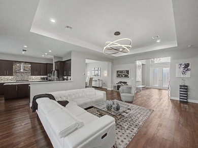 Experience elevated lakefront living in this exquisitely - photo 21