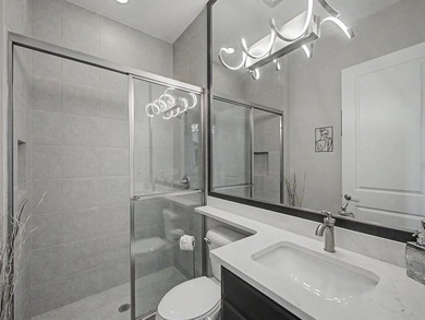 Experience elevated lakefront living in this exquisitely - photo 37