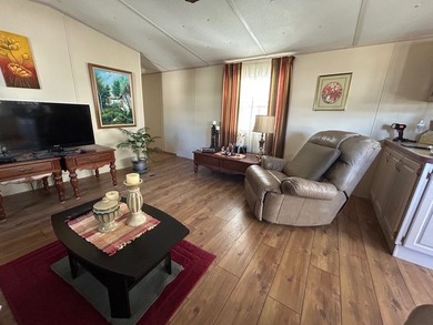 This 1995 manufactured home features 2 bedrooms and 2 bathrooms - photo 4
