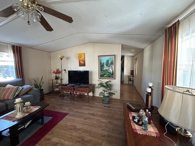 This 1995 manufactured home features 2 bedrooms and 2 bathrooms - photo 5