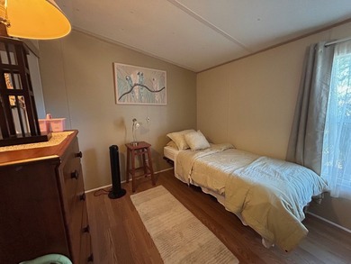 This 1995 manufactured home features 2 bedrooms and 2 bathrooms - photo 6