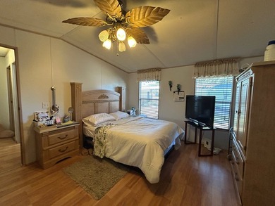 This 1995 manufactured home features 2 bedrooms and 2 bathrooms - photo 10
