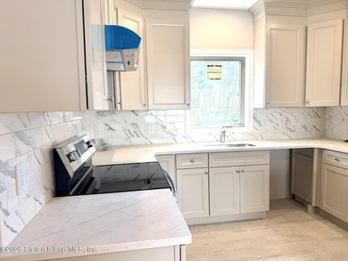 THIS SPACIOUS, DETACHED TWO-FAMILY *7 OVER 7*HOME LOCATED IN THE - photo 11
