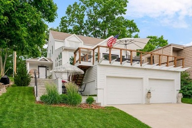 Welcome home to this incredible lake retreat in Lake Quivira! - photo 2