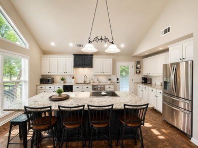 Come relax & take in the views at this custom-built 3-bedroom - photo 4
