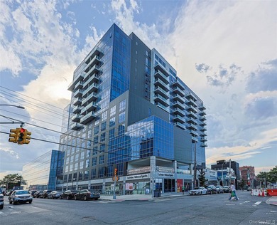 Located in the heart of Flushing, this 1,115 sq ft corner - photo 1