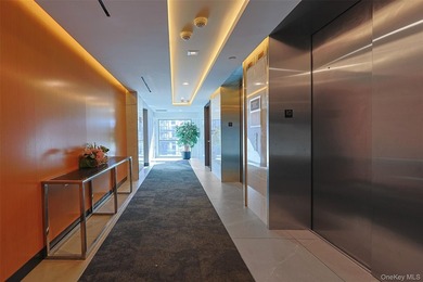 Located in the heart of Flushing, this 1,115 sq ft corner - photo 3