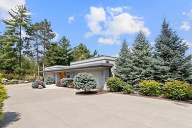 This stunning ranch home, designed by James R. Dresser in the - photo 5