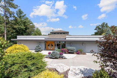 This stunning ranch home, designed by James R. Dresser in the - photo 6