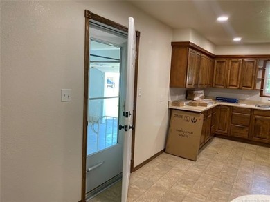 Newly Remodeled home with a 1 slip boat dock with electricity in - photo 5