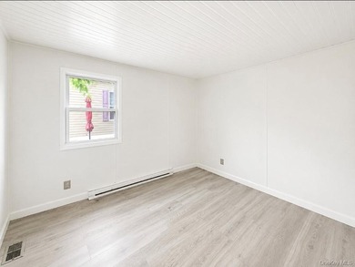 This charming 2-bedroom, 1-bath mobile home is located in a - photo 5