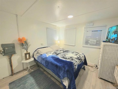 This charming 2-bedroom, 1-bath mobile home is located in a - photo 9