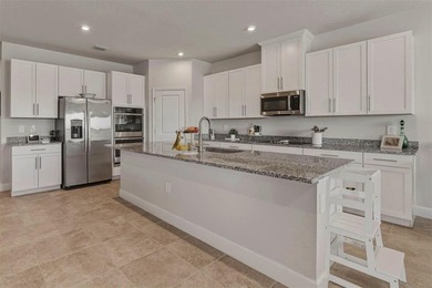 LIKE BRAND NEW! LYNN HAVEN FLOORPLAN 5 BEDROOM, 3 BATH, 2 CAR - photo 12