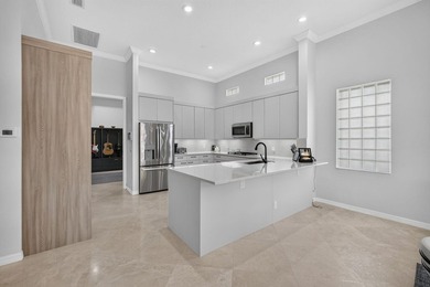 Welcome to this stunning waterfront & single-story residence in - photo 16