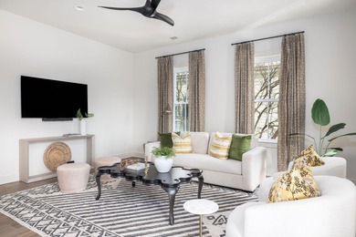 Welcome to this sun-filled two bedroom, two-and-a-half bath