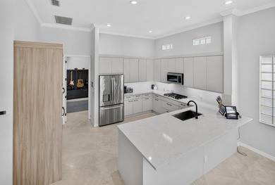 Welcome to this stunning waterfront & single-story residence in - photo 17