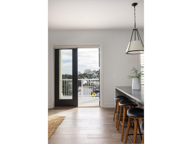 Welcome to this sun-filled two bedroom, two-and-a-half bath