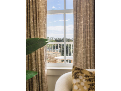 Welcome to this sun-filled two bedroom, two-and-a-half bath