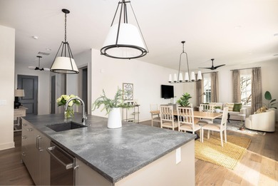 Welcome to this sun-filled two bedroom, two-and-a-half bath