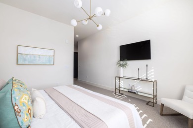 Welcome to this sun-filled two bedroom, two-and-a-half bath