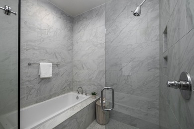 Welcome to this sun-filled two bedroom, two-and-a-half bath