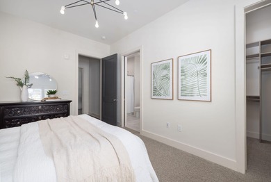 Welcome to this sun-filled two bedroom, two-and-a-half bath