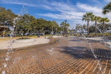 Welcome to this sun-filled two bedroom, two-and-a-half bath