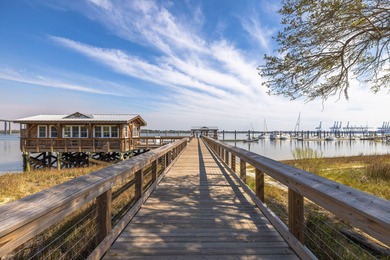 Welcome to this sun-filled two bedroom, two-and-a-half bath