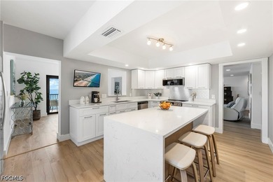 Experience refined waterfront living in this COMPLETELY - photo 10
