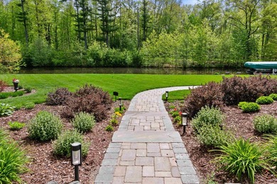 Nestled along 124 feet of shoreline on the Cranberry Canal - photo 11
