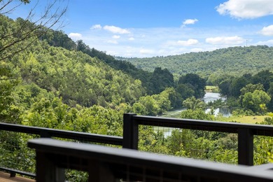 Experience the ultimate river-view retreat with this pristine - photo 2