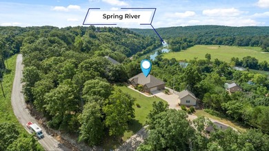 Experience the ultimate river-view retreat with this pristine - photo 3