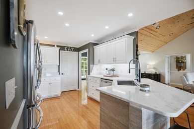 Experience the ultimate river-view retreat with this pristine - photo 9