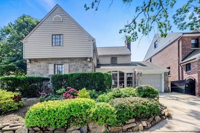 Welcome to 1264 Rhinelander Avenue, a rare custom-built side - photo 1