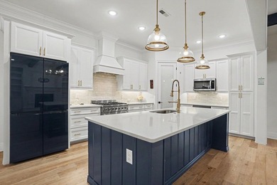 This stunning custom built 6 bed 4.5 bath home in the sought - photo 19