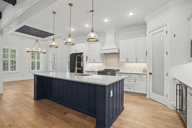 This stunning custom built 6 bed 4.5 bath home in the sought - photo 20