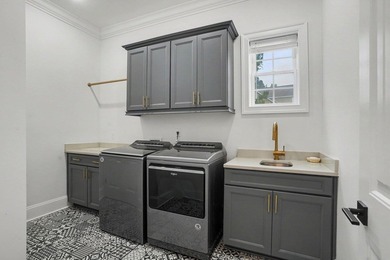 This stunning custom built 6 bed 4.5 bath home in the sought - photo 24