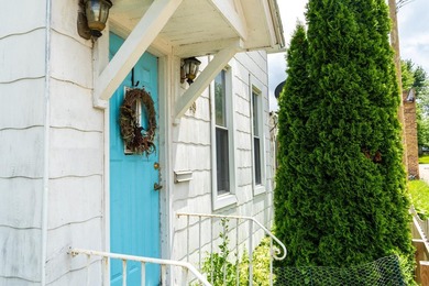 Welcome to this charming and well-maintained home offering a - photo 2