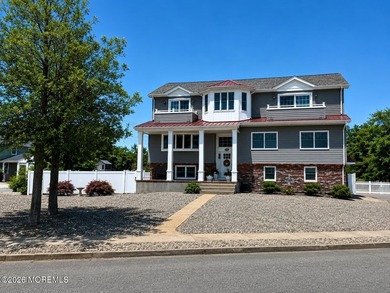 Welcome to this stunning 6-bedroom, 3-bath home in the highly - photo 4