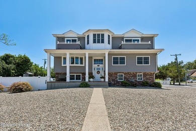 Welcome to this stunning 6-bedroom, 3-bath home in the highly - photo 6