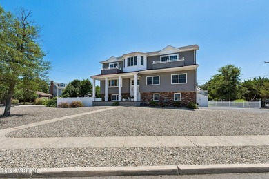 Welcome to this stunning 6-bedroom, 3-bath home in the highly - photo 7