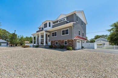 Welcome to this stunning 6-bedroom, 3-bath home in the highly - photo 8