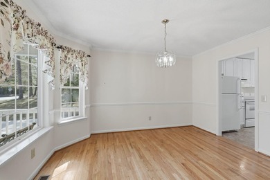 Welcome to 202 Shady Pine Lane, a delightful 3-bedroom, 2-bath