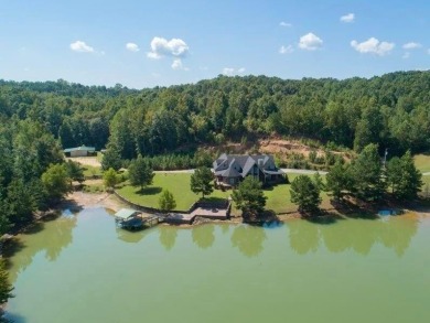 Hamilton-Stunning estate situated on 87 private acres behind a - Lake Home For Sale in Hamilton, Alabama